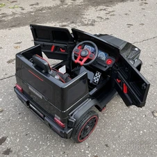 Двухместный детский электромобиль Mercedes M 6404EBLR-2(24V) черный фото 55